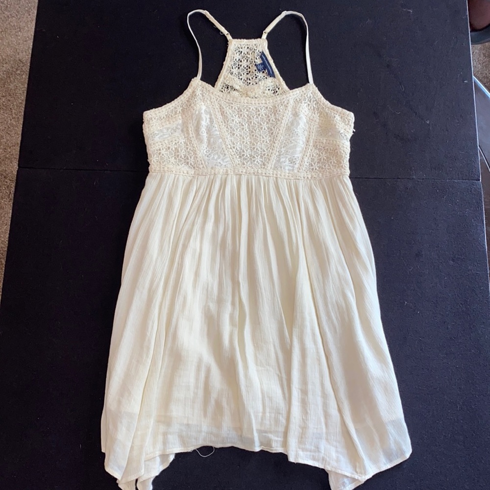 Cream-colored, flowy mini dress from AmericanEagle